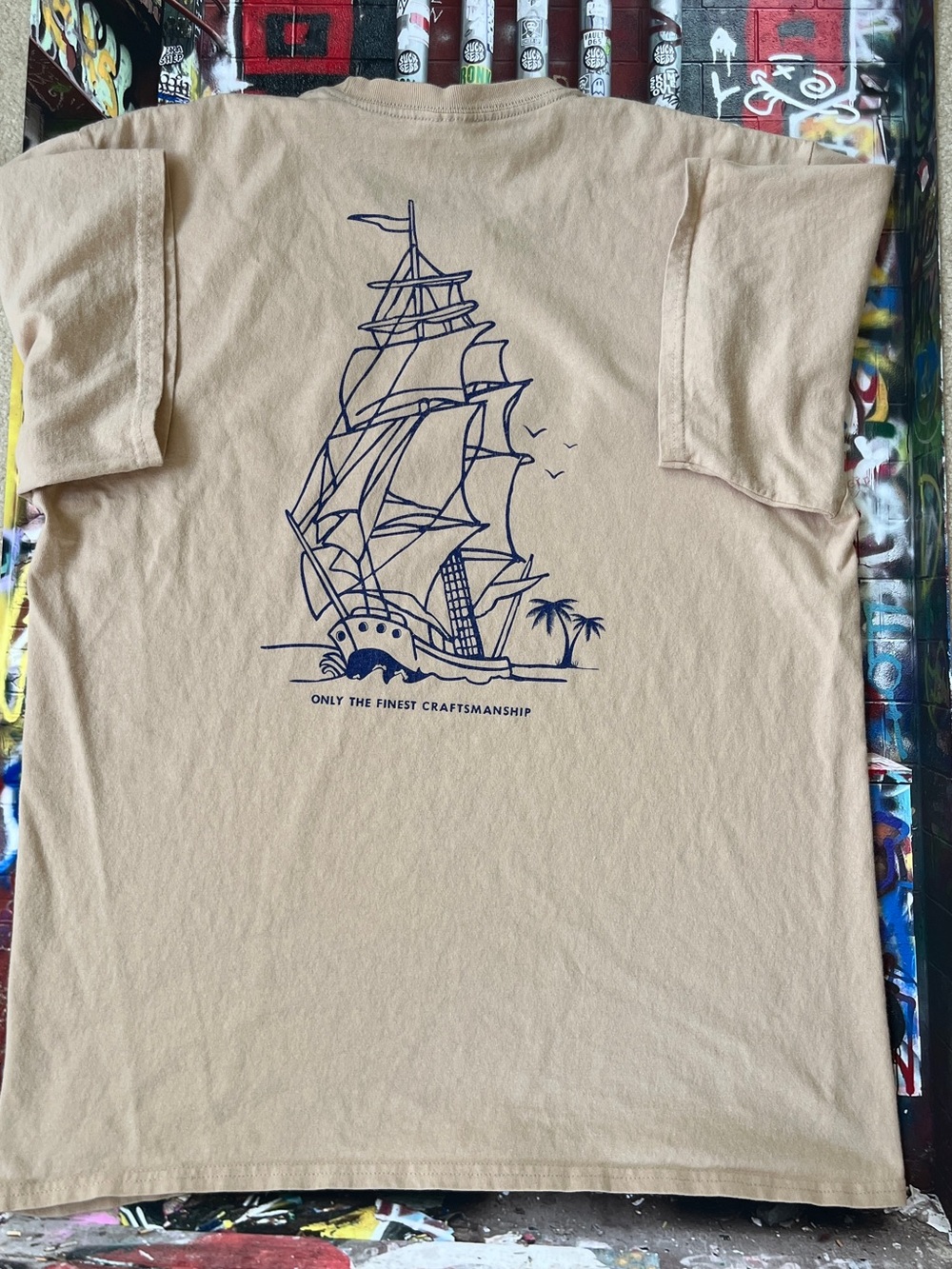 Empyre White Tee with Blue Palm Logo